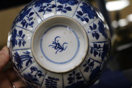 A Chinese Kangxi blue and white fluted bowl, decorated with flowers, with stand diameter 14.5cm height 7cm